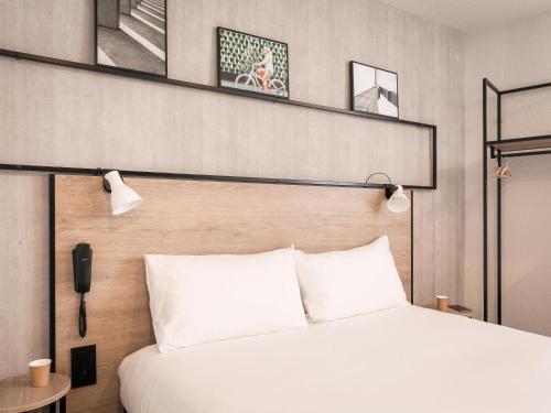 Postel nebo postele na pokoji v ubytování ibis Avignon Sud