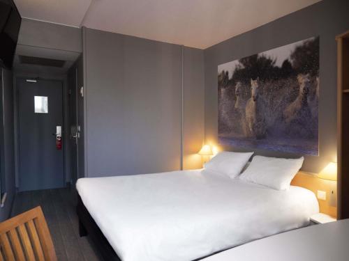 Katil atau katil-katil dalam bilik di ibis Arles