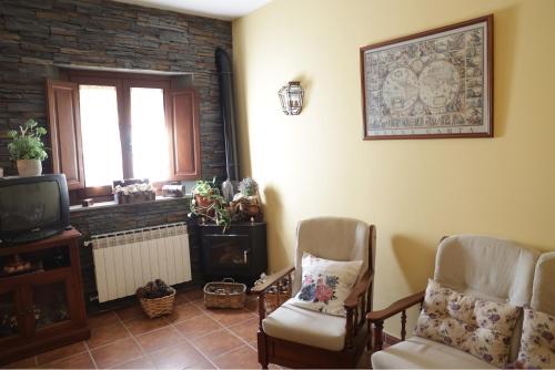 Televisyen dan/atau pusat hiburan di Casa Rural La Almazara Del Cristo