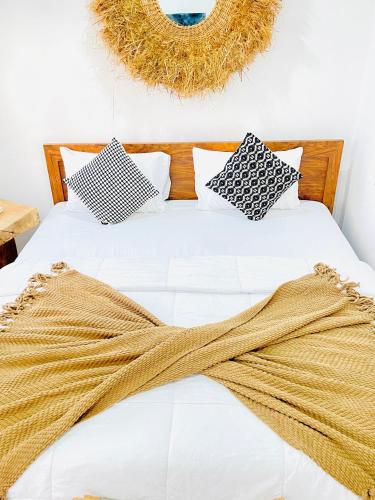 Postel nebo postele na pokoji v ubytování Ezeskof Beach Resort