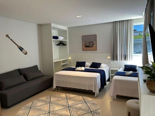 Postel nebo postele na pokoji v ubytování D´Santa Loft´s - Penha/SC