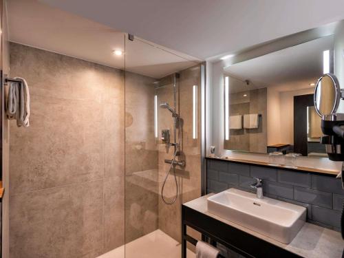 Ένα μπάνιο στο Mercure Hotel München Neuperlach Süd
