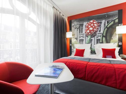Un ou plusieurs lits dans un hébergement de l'établissement Mercure Lille Centre Grand Place