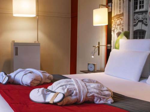 Un ou plusieurs lits dans un hébergement de l'établissement Mercure Lille Centre Grand Place