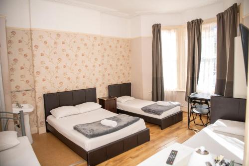 Ένα ή περισσότερα κρεβάτια σε δωμάτιο στο The Crystal Lodge Hotel
