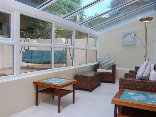 a room with a conservatory with a glass roof at 4 Bed in Studland DC046 in Studland