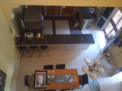 an overhead view of a living room and dining room at La Villa sûr in Niamey