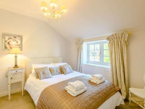 Ένα ή περισσότερα κρεβάτια σε δωμάτιο στο 3 Bed in Thornham KT104