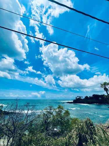 a view of the ocean from the beach at DNA secret palace in Tangalle