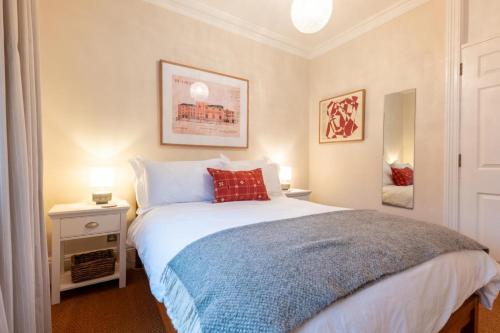 En eller flere senge i et værelse på Heritage Retreat - Aldeburgh