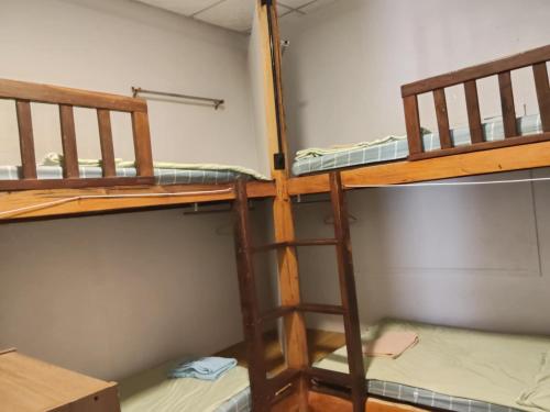 Una cama o camas en una habitación de Pa Kham hostel