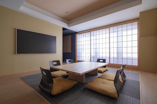 TV a/nebo společenská místnost v ubytování suirow 翠楼