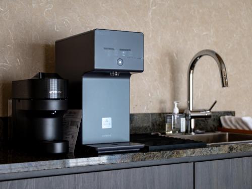 Kuchyň nebo kuchyňský kout v ubytování suirow 翠楼