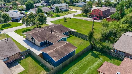 an aerial view of a house in a subdivision at Spacious Family Home BBQ and Outdoor Area in Shoreacres