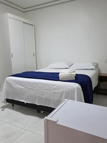 Ένα ή περισσότερα κρεβάτια σε δωμάτιο στο Ello Hotel Cristalina