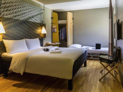 Cama o camas de una habitación en Ibis Sion