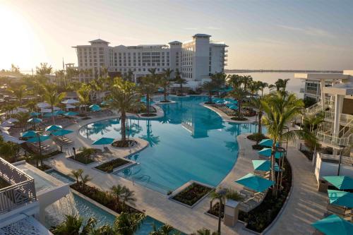 an aerial view of a resort with a pool at Sunseeker Resort Florida Gulf Coast, Curio Collection Hilton in Port Charlotte
