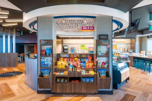 a grocery store with a display of food and drinks at Tru By Hilton Savannah Airport in Savannah