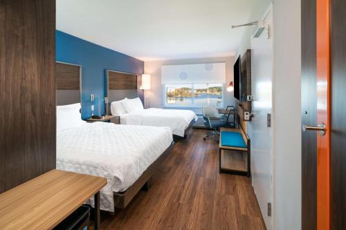 Ένα ή περισσότερα κρεβάτια σε δωμάτιο στο Tru By Hilton Savannah Airport