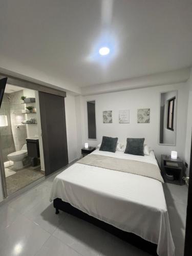 Ένα ή περισσότερα κρεβάτια σε δωμάτιο στο Apartamento en la América