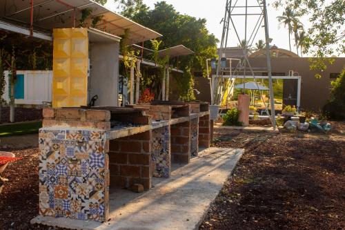 a house being constructed with a stone counter top at Apple House cerca de la playa in Barra de Navidad