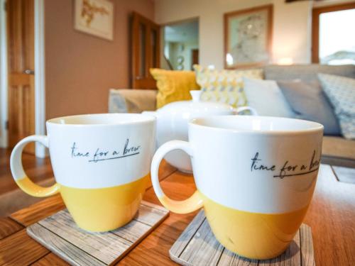 two coffee mugs with the words have for a home written on them at 4 bed property in Instow Devon 59699 in Instow