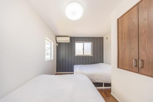 9-min walk to Ikebukuro Station, 1-min walk to Kanamecho Station Max 8 guests 70 sqm Free parking Direct access to Shinjuku, Shibuya, Ueno