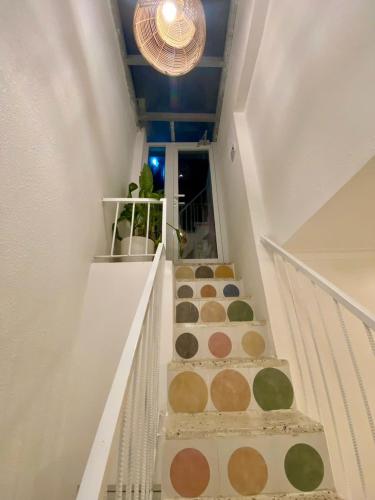 a stairway with a bunch of boxes on it at Homestay NAD nguyên căn tại Phan Thiết in Ấp Sung Xuân