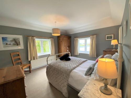 Ένα ή περισσότερα κρεβάτια σε δωμάτιο στο 4 Bed in Ningwood IC048