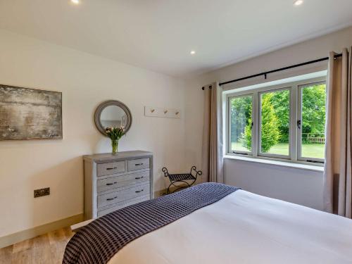 Ένα ή περισσότερα κρεβάτια σε δωμάτιο στο 3 Bed in Ruthin 88123