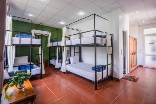 Ένα ή περισσότερα κρεβάτια σε δωμάτιο στο Oxalis Home