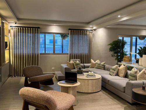a living room with a couch and a table at Caonabo35 Santo Domingo 205 in Santo Domingo