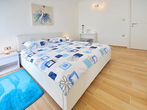 Posteľ alebo postele v izbe v ubytovaní Apartments Garden Residence Opatija