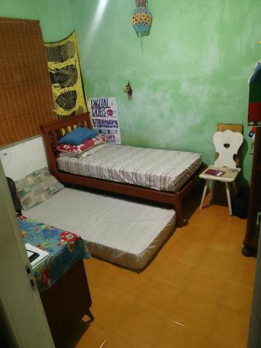 Кровать или кровати в номере Casa em Vila Estilo Portuguesa!