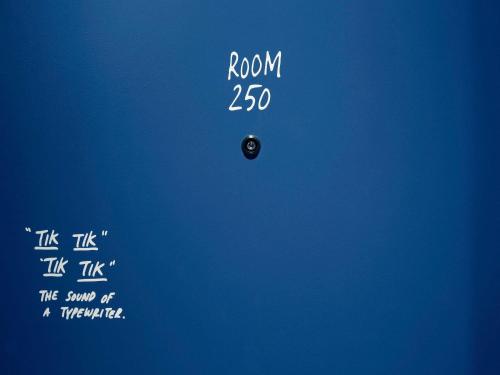 a poster for a movie with the words ronewayewayewayewayewayeway at INK Hotel Amsterdam - MGallery Collection in Amsterdam