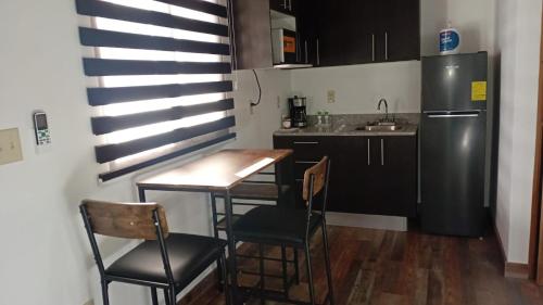 Kuchyň nebo kuchyňský kout v ubytování Casitas