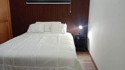 Postel nebo postele na pokoji v ubytování Casitas