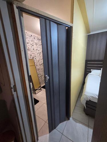 Ένα ή περισσότερα κρεβάτια σε δωμάτιο στο Zone 4 Motel