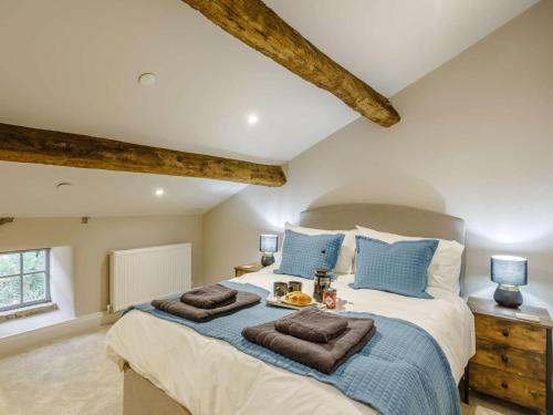 Ένα ή περισσότερα κρεβάτια σε δωμάτιο στο 4 Bed in Skipton 84017