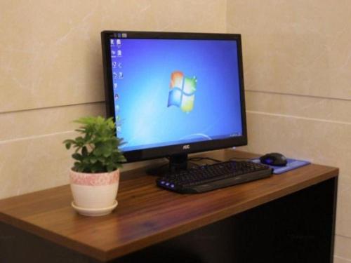Μια τηλεόραση ή/και κέντρο ψυχαγωγίας στο GreenTree Inn Suzhou Industrial Zone Yangcheng Lake Weiting Mong Kok Express Hotel