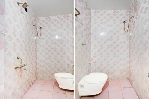 a bathroom with a toilet and a shower at Hotel O Neyveli Central Railway Junction Formerly MP Residency in Neyveli