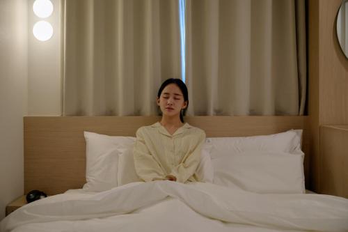 Aank Hotel Cheongnyangniにあるベッド