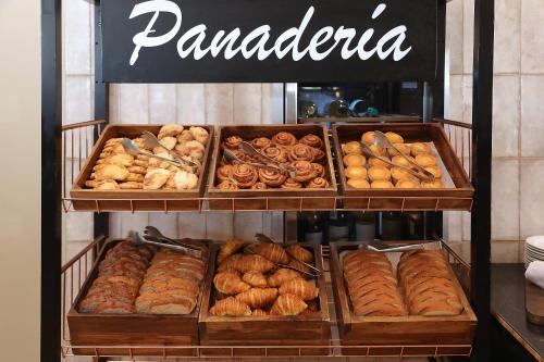a bakery with many different types of donuts and pastries at Clarion Hotel Real Tegucigalpa in Tegucigalpa