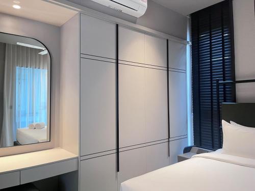 Ένα ή περισσότερα κρεβάτια σε δωμάτιο στο Luxury 3BR Genting Suite Private Jacuzzi Skyway Access 6pax