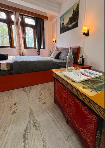 Ένα ή περισσότερα κρεβάτια σε δωμάτιο στο Hotel peace