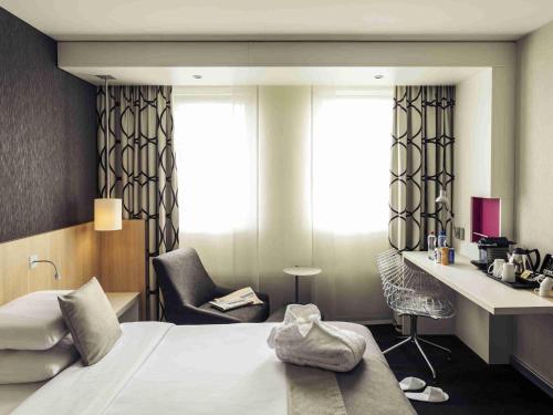 Кровать или кровати в номере Mercure Amsterdam City Hotel