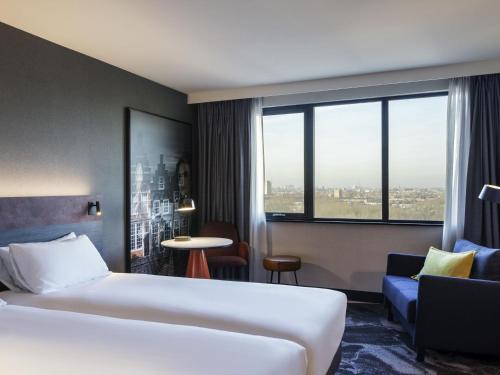 Кровать или кровати в номере Mercure Amsterdam City Hotel