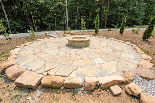 a stone circle with a fountain in the middle at Stunning and Fully-Equipped Tiny House with Breathtaking Views of South Cumberland State Park in Monteagle, TN in Monteagle