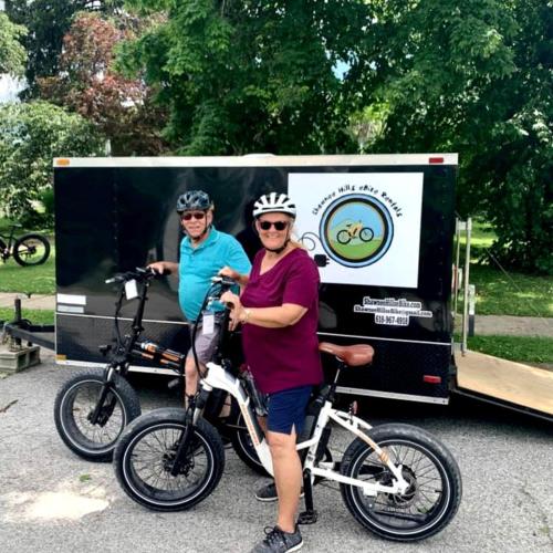 two people with their bikes in front of a trailer at Beautiful A-frame with Hot-tub in Makanda, Illinois in Goreville