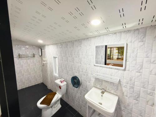 Koupelna v ubytování Trang Oasis Waterpark Hotel